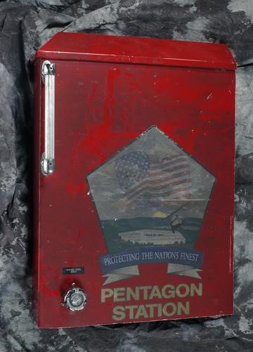 Red box with button at Pentagon Station that says "Protecting the Nation's Finest"