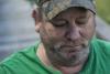  Hurricane Harvey survivor listens to FEMA Corps Eagle 8 team