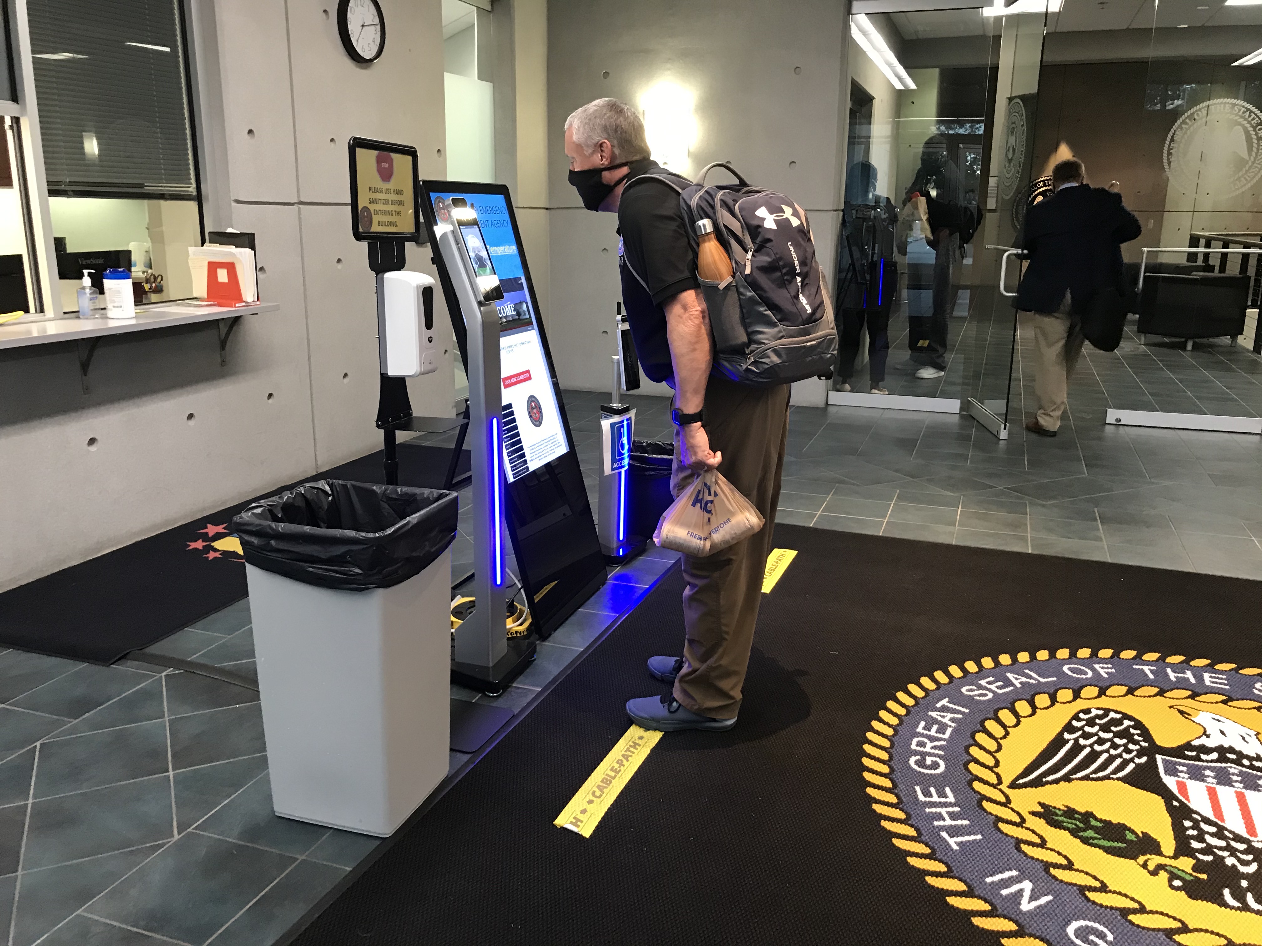 a man getting his head scanned 