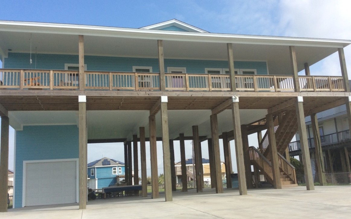 A Building Elevated on Posts/Piles with an Enclosure used for Parking