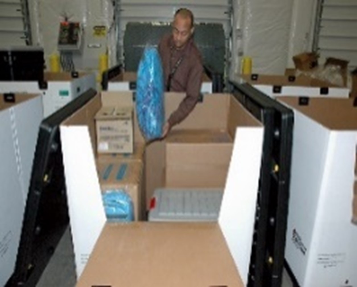 Strategic stockpile supplies being packed in to large shipping boxes
