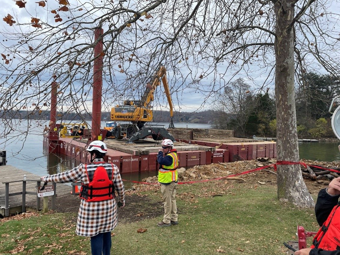 Virginia Department of Emergency Management (VDEM), U.S. Army Corps of Engineers, and FEMA staff survey cleanup progress on Claytor Lake on Nov. 19, 2024