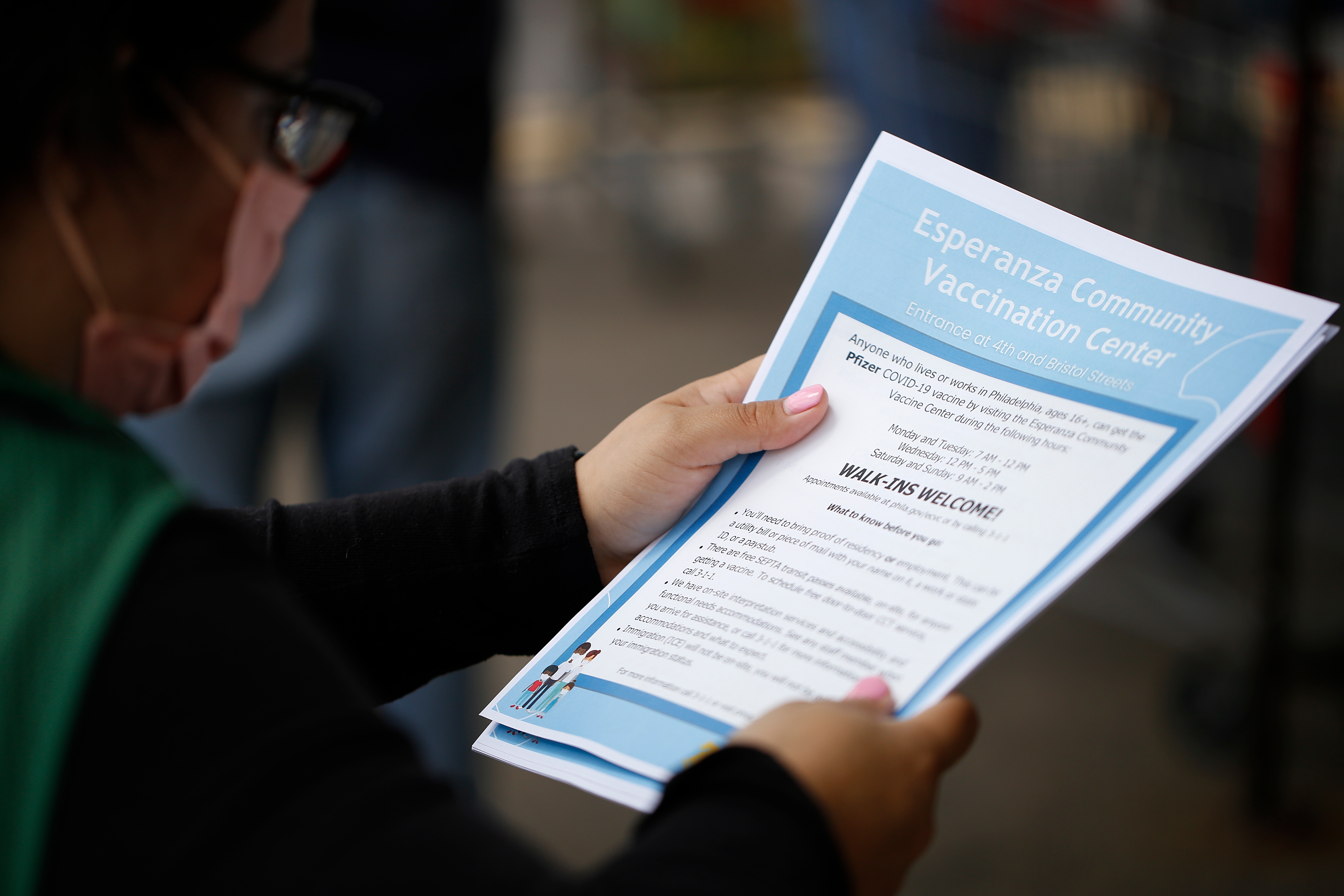 FEMA staff assisted in the distribution of flyers like this one with information about what to expect during a visit to the Esperanza Community Vaccination Center. 