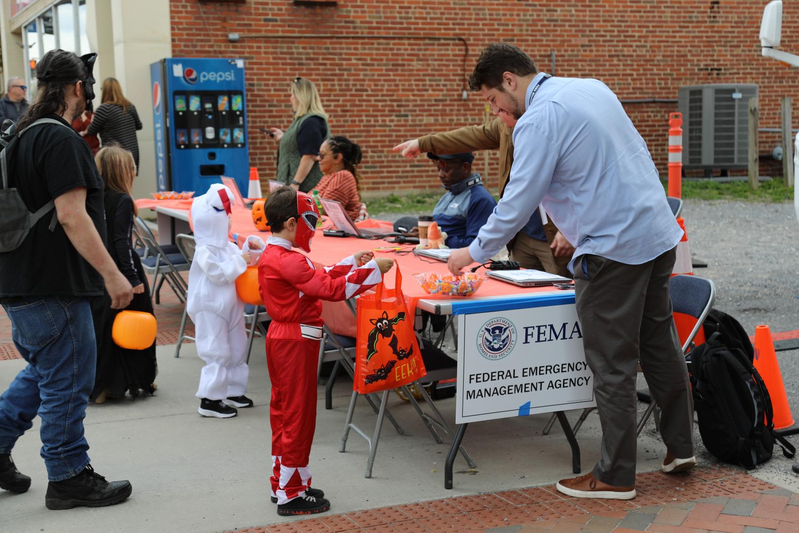 kids in halloween costumes outside drc
