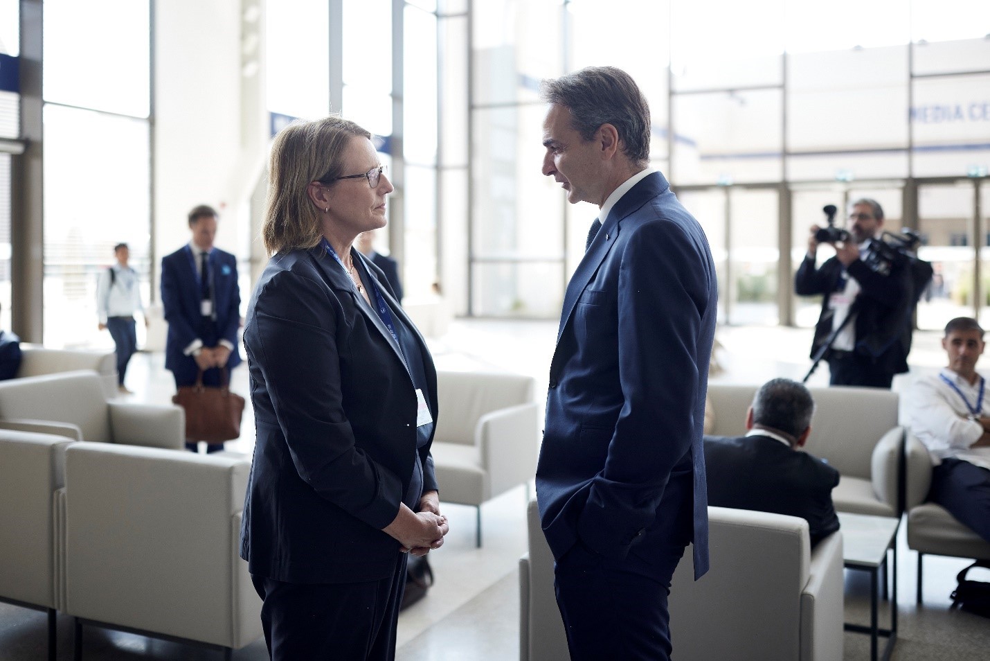 Greek Prime Minister Kyriakos Mitsotakis (right) and FEMA Administrator Deanne Criswell (left) discuss the importance of resiliency in the face of worsening disasters during their brief meeting at COP28. (Dimitris Papamitsos, Official photographer to the Greek Prime Minister)