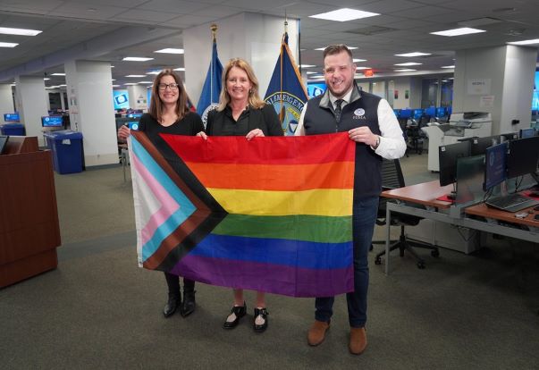  Administrator Criswell Unveils Inclusive Rainbow Flag at FEMA National Response Coordination Center Alongside Associate Administrator Anne Bink and External Affairs Director Justin Knighten