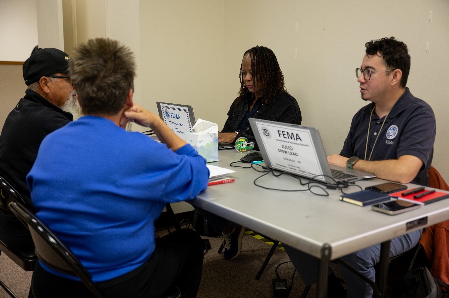 FEMA staff assisting survivors on Oct. 11, 2024, at the Disaster Recovery Center in Independence, Va.