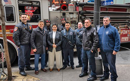 U.S. Fire Administrator Dr. Lori Moore-Merrell (center left) stands with members of the New York City Fire Department. 