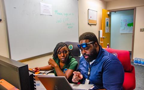 Caption: <p>St. Thomas, U.S. Virgin Islands, May 23, 2024 -- Shantelle Eddy, of the Virgin Islands Territorial Emergency Management Agency, and Ozzie Bradshaw, of FEMA's Virgin Islands Caribbean Area Office, both focus on the Capstone's operational integration Joint Functional Exercise at VITEMA's Emergency Operations Center in Estate Nisky. The exercise focused on a response to a Category 3 hurricane. FEMA/Eric Adams</p>