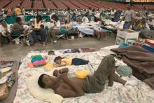 Thomas John and baby brothers are among the 18,000 Hurricane Katrina survivors that are housed in the Red Cross shelter 