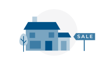 House with a "sale" sign in front of it