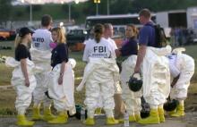 Figure 13: FBI evidence team at crime scene