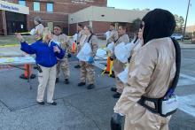 Emergency managers wearing personal protective equipment during a training
