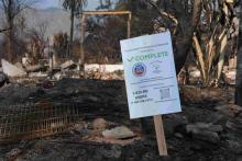 USEPA hazardous materials removal complete sign in wildfire debris