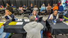 Survivors visit a Disaster Recovery Center to learn and apply for disaster assistance to recover from Hurricane Helene. 