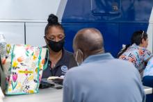 FEMA Personnel Helps Survivor Register for Assistance